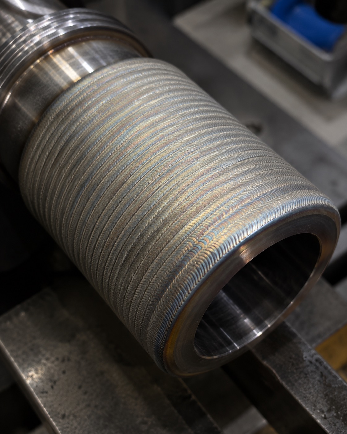 Hardfaced sleeve overlay before finish machining