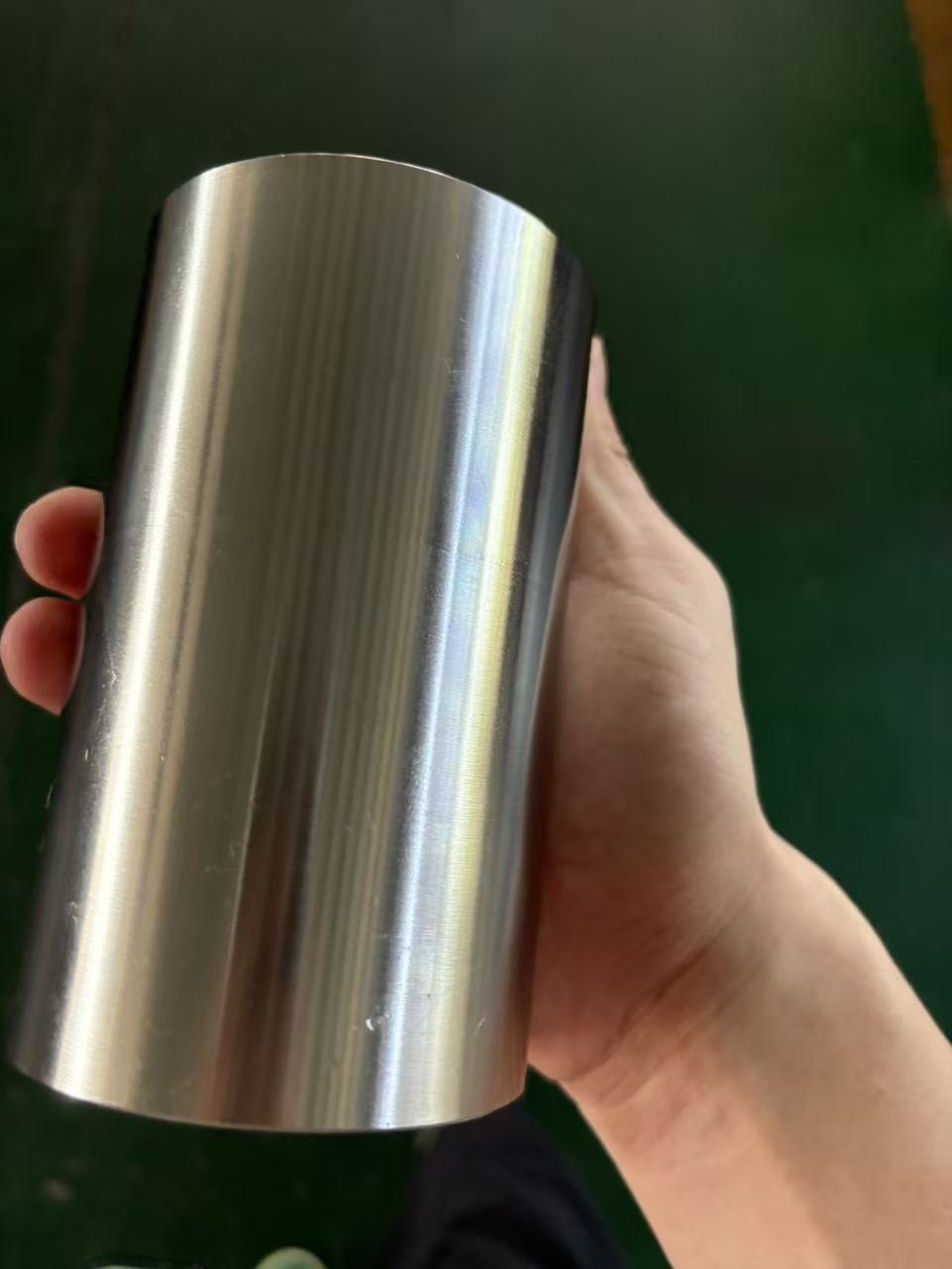 Sleeve machined with allowance before welded hardfacing overlay