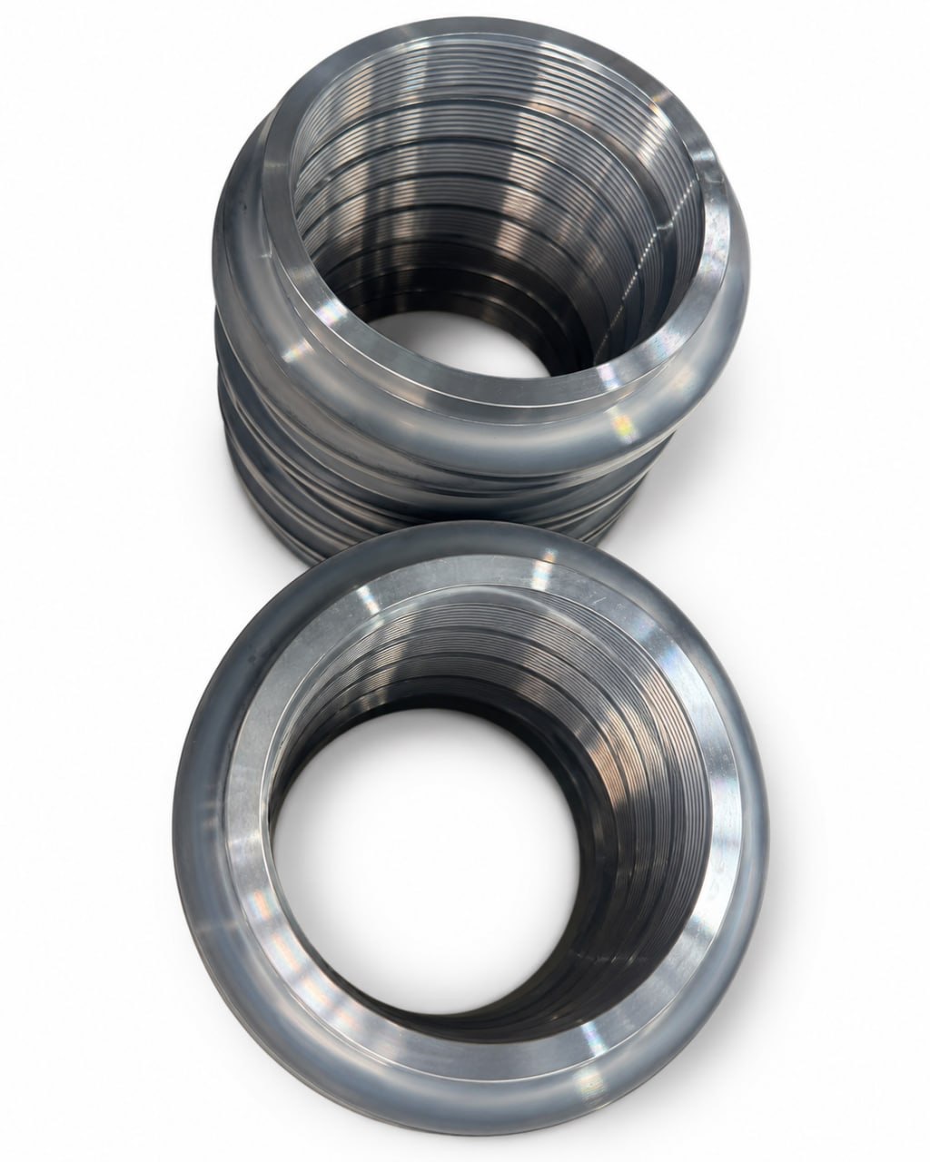 Close-up of finished nitrided pump hard sealing ring with machined thread and sealing surfaces